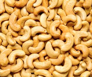 Healthy food, cashews rich in heart friendly fatty acids. Cashew nuts as food background